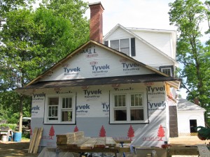 New energy efficient addition with chimney to accomdate fule efficient wood stove.